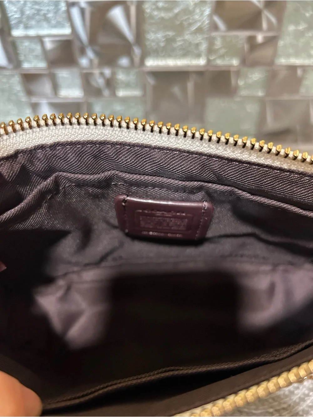 Coach compact clutch